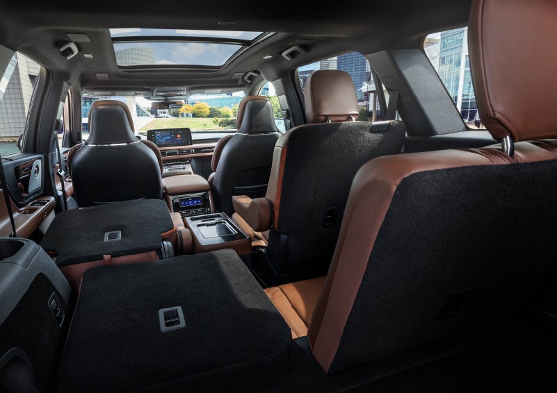 The interior of the 2025 Lincoln Aviator® SUV is shown with two seats folded down for added space. | Lincoln of Ramsey in Ramsey NJ