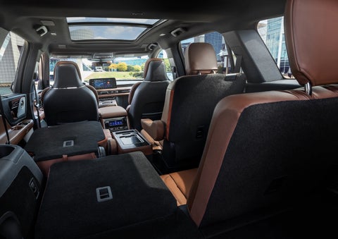 The interior of the 2025 Lincoln Aviator® SUV is shown with two seats folded down for added space. | Lincoln of Ramsey in Ramsey NJ