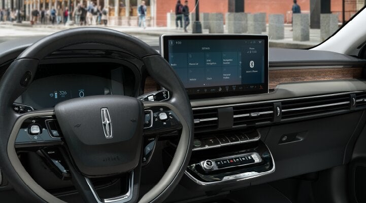 The center screen of the new 2025 Lincoln Corsair® SUV is showcased with its SYNC® 4 capabilities highlighted | Lincoln of Ramsey in Ramsey NJ