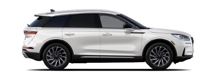 The passenger side of a Lincoln Corsair® SUV is shown in the Ceramic Pearl extra-cost exterior paint option. | Lincoln of Ramsey in Ramsey NJ