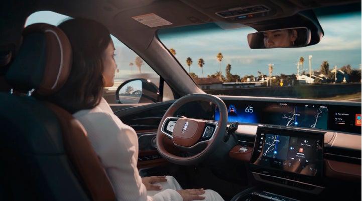 A person is shown driving hands-free on the highway with available Lincoln BlueCruise technology. | Lincoln of Ramsey in Ramsey NJ