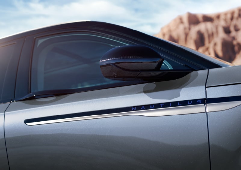 Blue lettering on the side of the vehicle that reads nautilus indicates the available hybrid powertrain. | Lincoln of Ramsey in Ramsey NJ