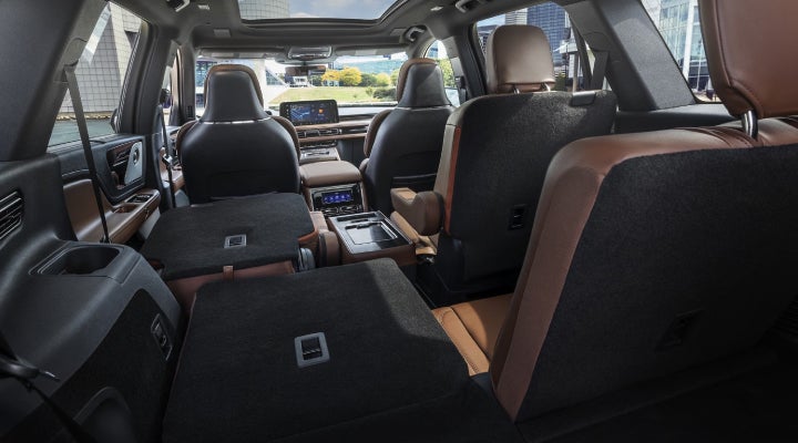 One side of the PowerFold® third-row seat and a second-row seat are folded forward in the 2026 Lincoln Aviator® SUV. | Lincoln of Ramsey in Ramsey NJ