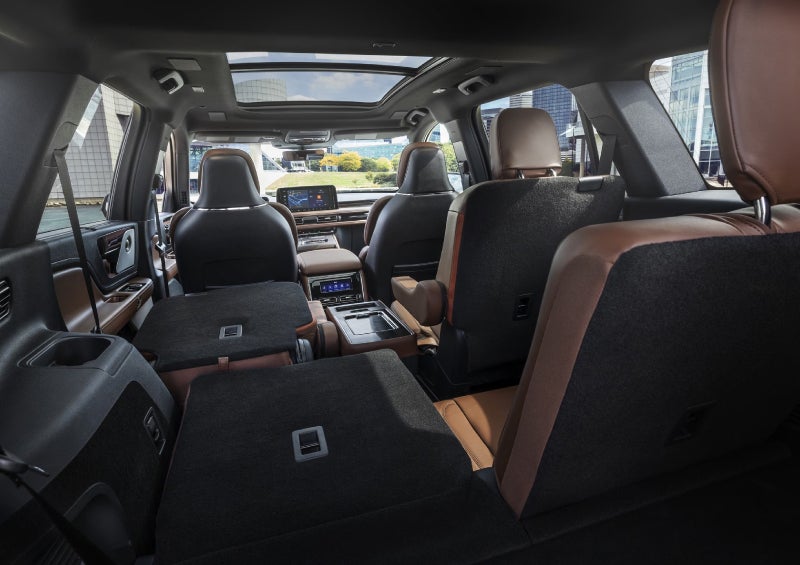 One side of the PowerFold® third-row seat and a second-row seat are folded forward in the 2026 Lincoln Aviator® SUV. | Lincoln of Ramsey in Ramsey NJ
