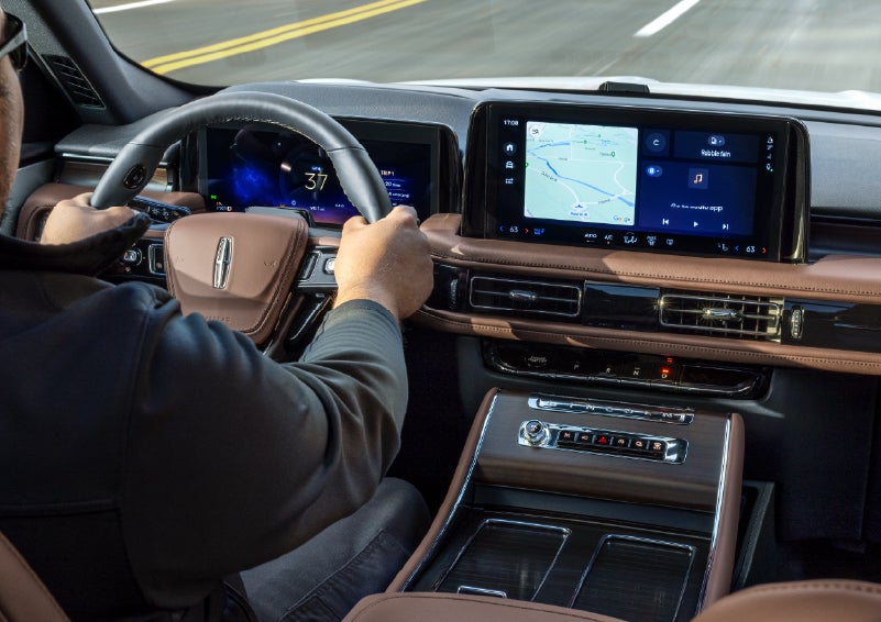 A person is driving a 2026 Lincoln Aviator® SUV as seen from inside the cabin. | Lincoln of Ramsey in Ramsey NJ