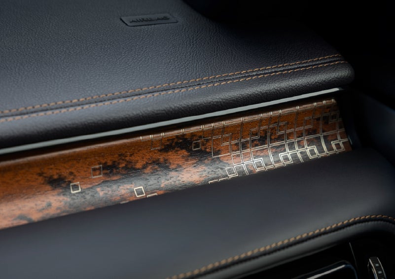 A close-up shot of the 2026 Lincoln Aviator® dashboard with unique black and brown accents and brown stitching. | Lincoln of Ramsey in Ramsey NJ