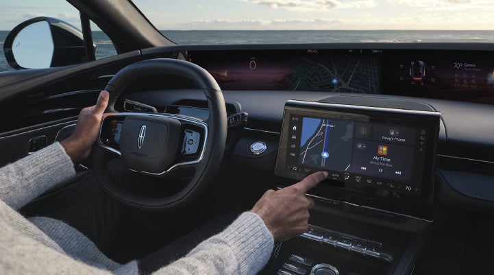 The driver of a 2026 Lincoln Nautilus® SUV interacts with the new Lincoln Digital Experience. | Lincoln of Ramsey in Ramsey NJ