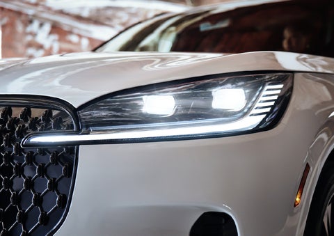 A close-up of a headlamp on the 2027 Lincoln Aviator® SUV is shown. | Lincoln of Ramsey in Ramsey NJ
