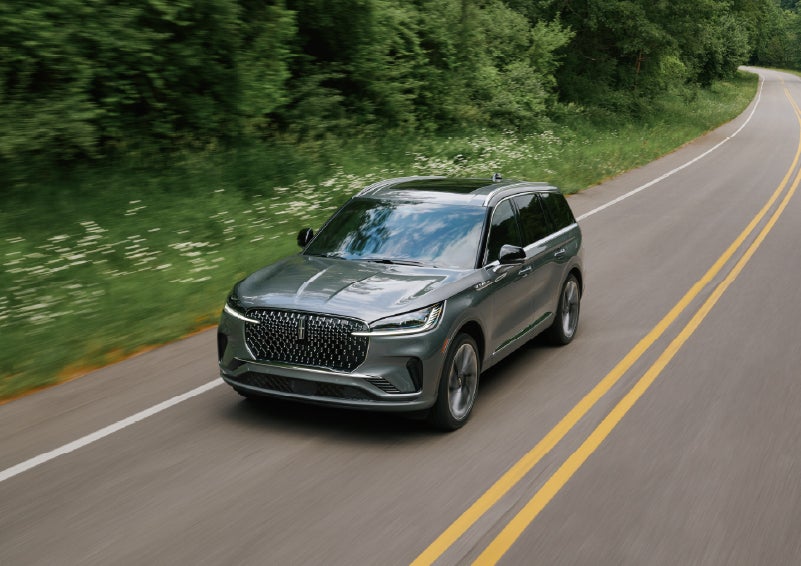 A 2027 Lincoln Aviator® SUV is being driven down a road. | Lincoln of Ramsey in Ramsey NJ