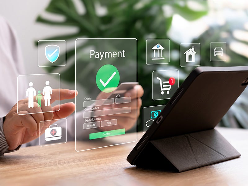 Digital overlay of a payment interface on a tablet screen.